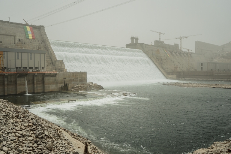 A general view of the Grand Ethiopian Renaissance Dam (GERD) in Guba, Ethiopia, on February 20, 2022. - Ethiopia began generating electricity from its mega-dam on the Blue Nile on Sunday, a milestone in the controversial multi-billion dollar project. (Photo by Amanuel SILESHI / AFP)