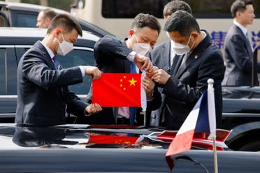 من زيارة الرئيس الفرنسي للصين (فرانس برس)